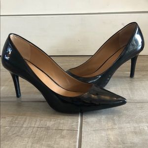 Black patent classic pumps